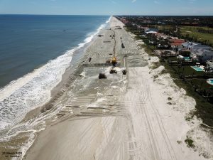 An oblique aerial photograph of the beach fill progress (29-March-2024).
